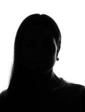 Young woman look ahead with flowing hair - horizontal silhouette